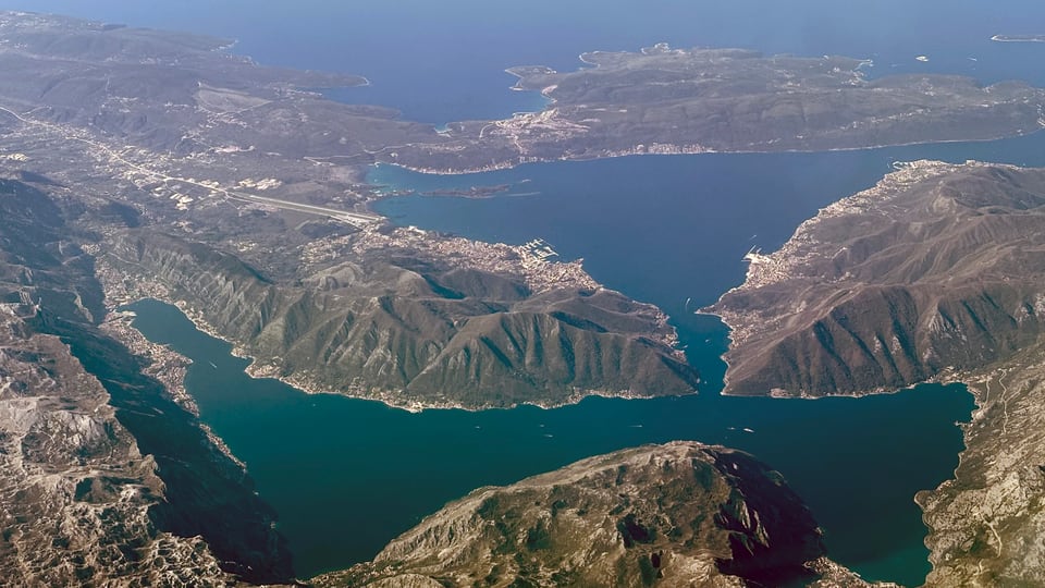 Bay of Kotor coastline for cross-border private transfers